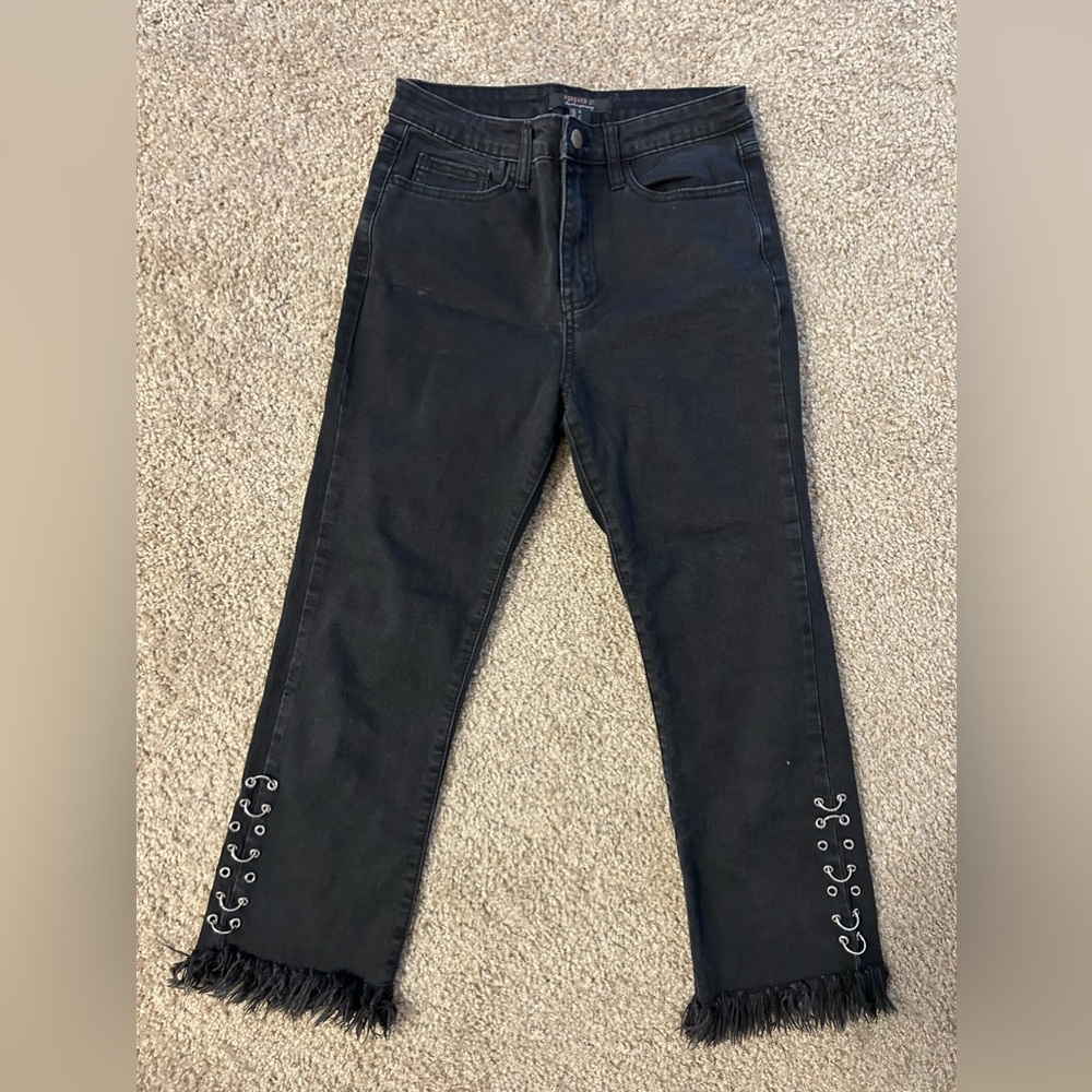 Black jeans with chain details